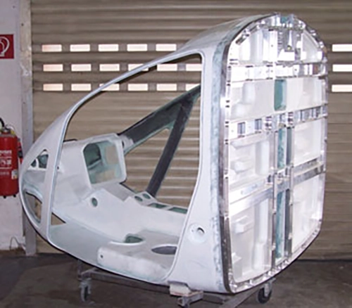 Computer screens and cocpit stucture prototype. Wing ribs and stringers.